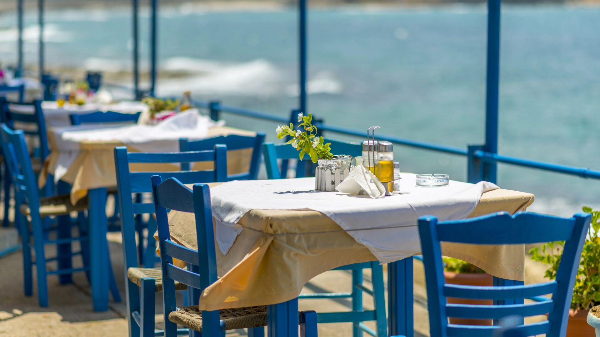 empty chairs tables restaurant